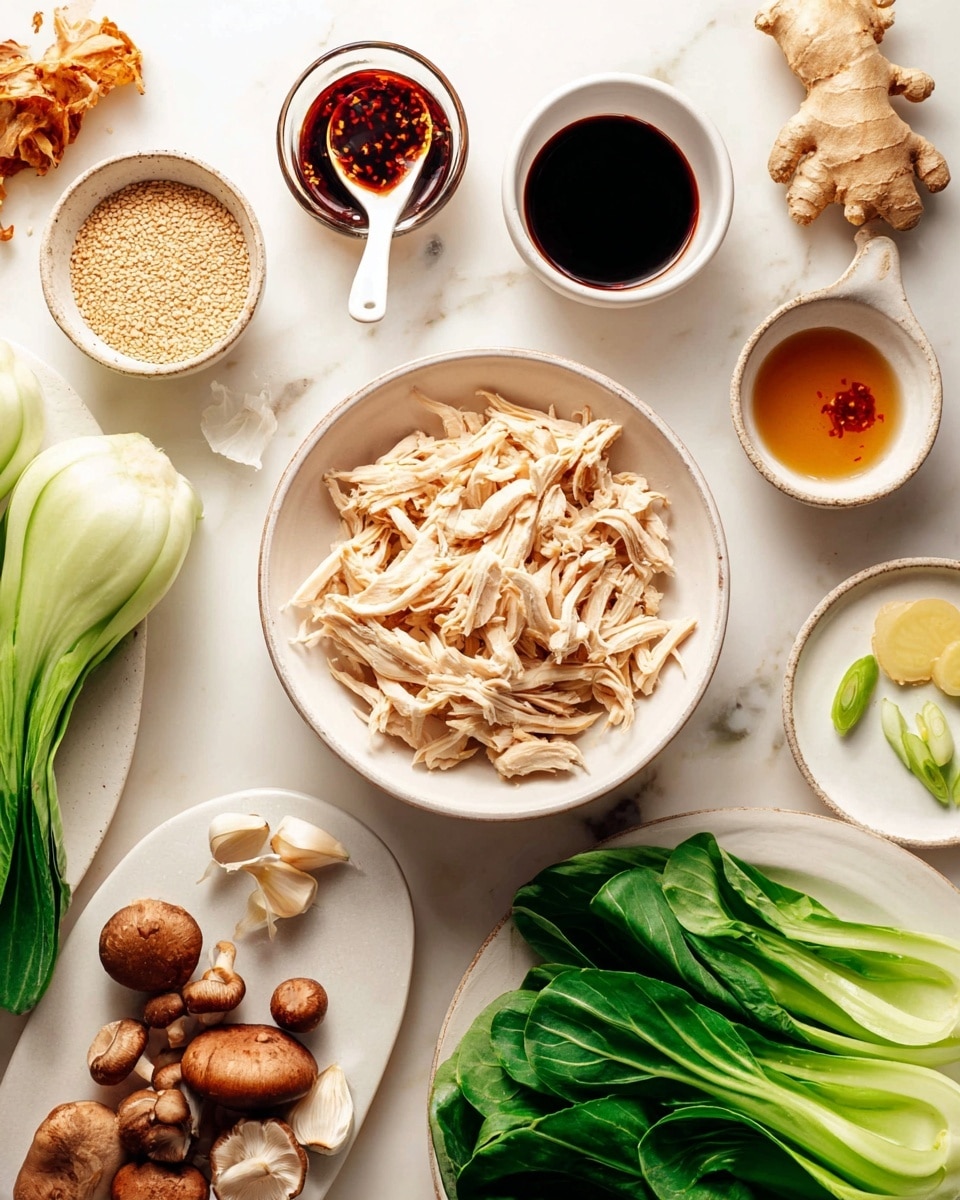 A white bowl filled with shredded pale beige chicken sits in the bottom center of the image. Surrounding it are several small white bowls and plates: one with a thick dark brown sauce, another holding sesame seeds, one with a dark red chili oil and a white spoon inside, and a smaller bowl with a light brown liquid. There is also a white plate with a small piece of sliced fresh ginger and three garlic cloves. Around these, green onions and vibrant green bok choy leaves with their white stems are laid on a white marbled surface. Brown mushrooms are scattered near the greens, and a small piece of fresh ginger root rests near the chili oil. The whole setup is bright, clean, and organized for a cooking prep shot. Photo taken with an iphone --ar 4:5 --v 7