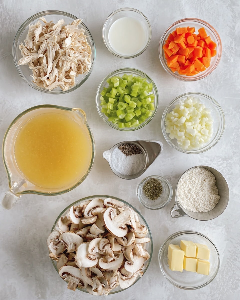 A top-down view of several clear glass bowls and a large clear glass measuring jug arranged on a white marbled surface, each holding different ingredients. In the upper left is a bowl of light beige shredded chicken strips, followed clockwise by a small bowl of bright green sliced celery and another with small orange diced carrot pieces. Next to them is a small clear glass cup filled with a white liquid, and below that a large clear glass jug filled with yellow chicken broth. Below the broth is a small clear bowl with salt and black pepper, and near the center right is a small metal measuring cup filled with white flour. Moving left, there is a small clear bowl containing minced garlic, a larger clear bowl filled with white diced onions, a very small clear bowl with dried green herbs, and a small clear bowl holding two light yellow pats of butter. Centered in the image is a large clear glass bowl filled with sliced light brown mushrooms with white inner parts showing. The overall layout is neat and organized, with soft natural lighting. Photo taken with an iphone --ar 4:5 --v 7