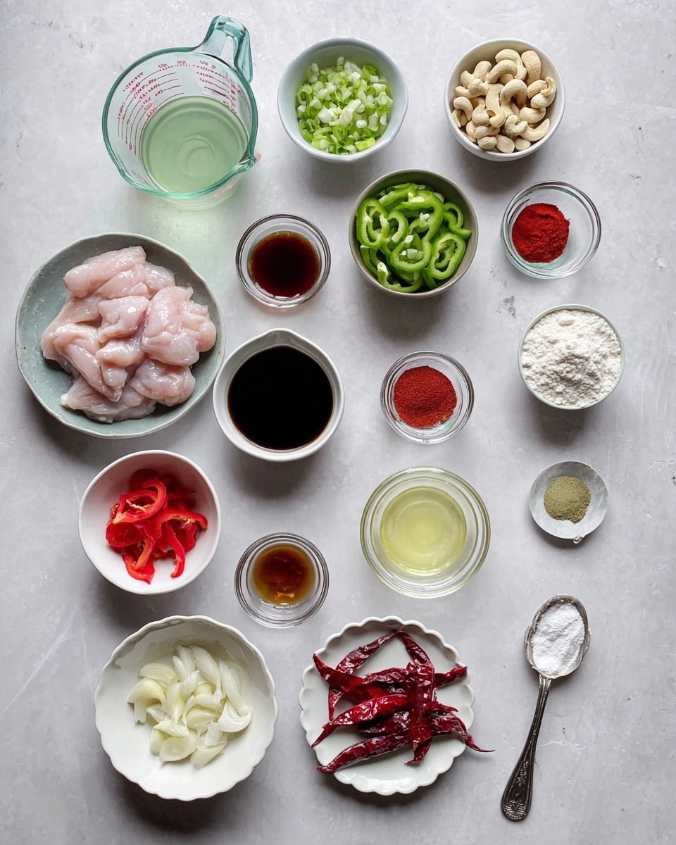 The image shows many small white bowls and clear glass cups arranged on a white marbled surface. Starting from the top left, there is a clear glass measuring cup with a light green liquid, followed by a white bowl with cashew nuts, and another white bowl with chopped green onions. Below these, there is a small white bowl with sliced green bell peppers and a white bowl with sliced red bell peppers. A white bowl on the left holds thin pieces of raw chicken. Near the center, there are small glass cups filled with various liquids and sauces: one dark brown, one red ketchup-like sauce, another clear, and a bowl of red powder. A white scalloped bowl holds a pale yellow liquid. Below, there are sliced shallots in a white bowl, minced garlic and ginger on a white plate, and three dried red chilies. Two white measuring cups contain flour and cornstarch. A small metal spoon holds white salt. Everything is neatly placed, and the tones range from pale pink chicken to bright greens and reds on a soft white marbled background. Photo taken with an iphone --ar 4:5 --v 7