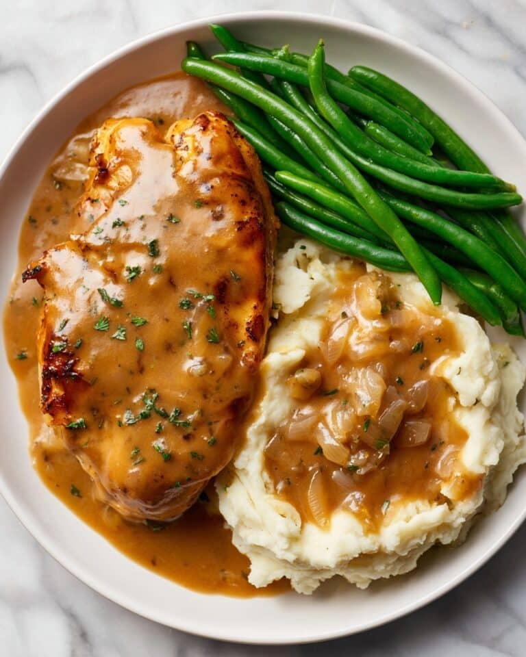 Smothered Chicken with Rich Garlic Onion Gravy Recipe
