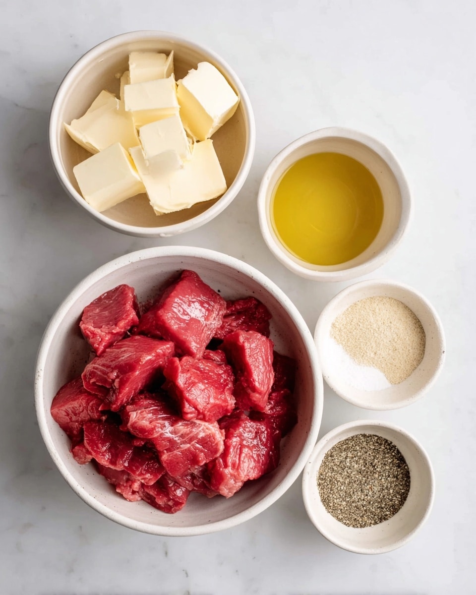 Four white bowls sit on a white marbled surface, each with different ingredients. The largest bowl at the bottom holds bright red chunks of raw meat with a slightly glossy texture. To the top left, a smaller bowl shows thick pale yellow slices of butter stacked loosely. To the right of the butter, a small bowl contains golden liquid, likely oil, smooth and reflective. Next to the oil bowl, another bowl has four sections of dry ingredients: two light beige powders, white salt, and black pepper, arranged neatly side by side. Photo taken with an iphone --ar 4:5 --v 7