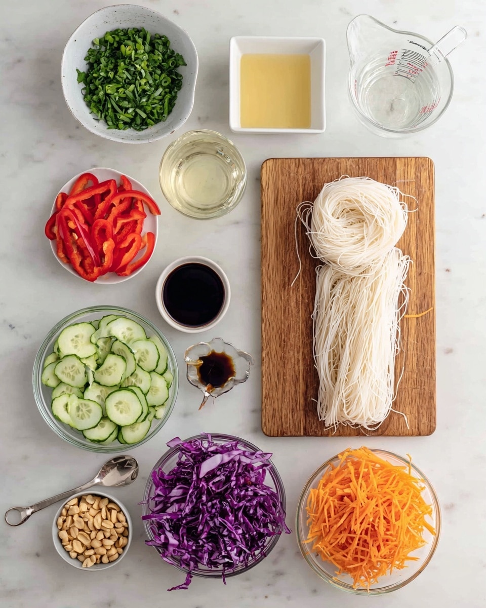 The image shows various fresh ingredients and sauces arranged neatly on a white marbled surface. In the center right, a wooden cutting board holds a bundle of dry white rice noodles with a thin and delicate texture. Surrounding the board, from top left moving clockwise, there is a white bowl filled with chopped green leafy herbs, a small white square container with more chopped herbs, a white bowl with a light yellow liquid, and a clear measuring cup with water. Below these, there is a small white cup of dark soy sauce, and a small metal spoon with a dark thick paste. A clear bowl holds bright red sliced bell peppers, and beneath it, a white bowl is filled with shredded purple cabbage. To the bottom left, a white bowl contains sliced cucumbers, next to it a clear bowl has shredded orange carrots, and finally, a white bowl with a yellow rim is filled with roasted peanuts. All ingredients are fresh and colorful, clearly separated, and ready for preparation. Photo taken with an iphone --ar 4:5 --v 7