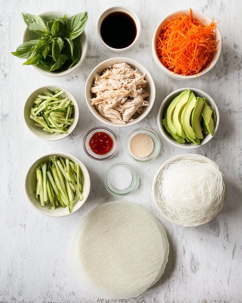 The image shows several small white bowls arranged on a white marbled surface, each containing different ingredients for a dish. In the bottom left, a bowl holds fresh green basil leaves with smooth texture. To the right, a bowl is filled with bright orange thin shredded carrots. Next to it, a bowl contains light beige shredded chicken with a fibrous texture. Above the chicken, a bowl has light green slices of creamy avocado. To the left of the avocado, a bowl holds fresh green cucumber sticks with a crisp texture. There is a bowl of thin, white rice noodles with a soft, tangled appearance near the bottom right. Above the noodles, there are three small white bowls: one with a red chili sauce, one with white granulated salt, and one with a light clear liquid. There is also a small glass bowl with pale beige powder. At the bottom center, a round white plate holds semi-translucent rice paper sheets stacked evenly, showing a woven pattern. All items are neatly arranged on a white marbled surface. Photo taken with an iphone --ar 4:5 --v 7