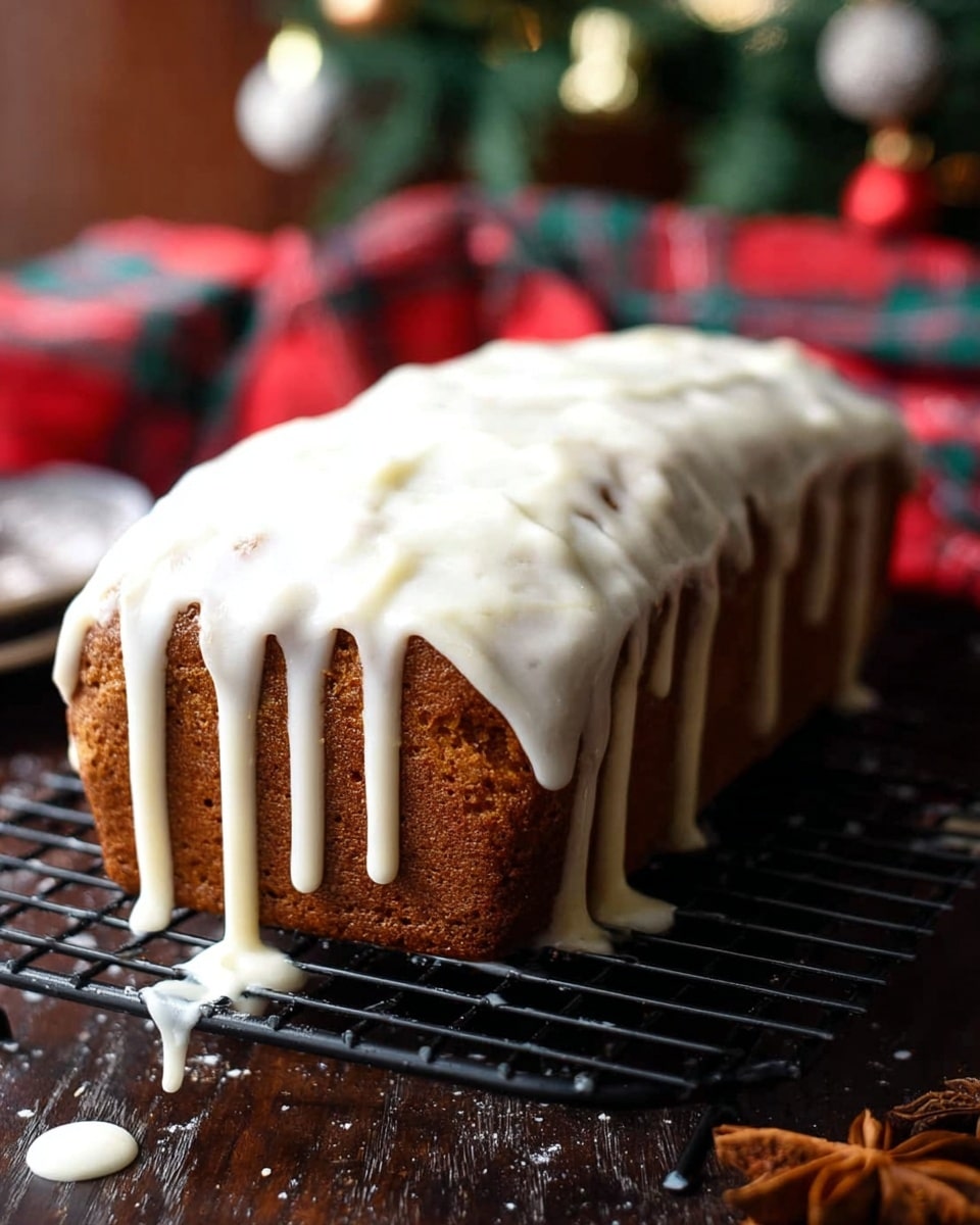 A rectangular brown loaf cake is shown with a thick layer of white icing dripping down the sides unevenly. The cake sits on a black wire cooling rack with some icing drops below it. In the background, there is a red and green plaid cloth and a blurry Christmas tree with decorations. The surface beneath the rack has a dark wood texture, but the scene should be imagined on a white marbled surface. Photo taken with an iphone --ar 4:5 --v 7