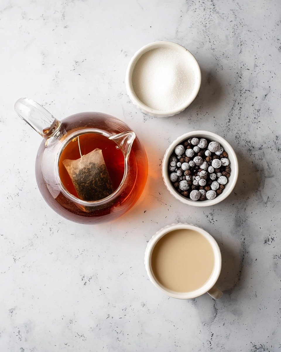 A clear glass teapot filled with dark amber tea is placed on the left side of a white marbled surface, showing the tea bag steeping inside. To the right of the teapot, there are three white ramekins: the top ramekin contains fine white sugar, the middle ramekin holds whole black peppercorns dusted with white powder, and the bottom ramekin is filled with light beige liquid, all arranged neatly in a loose triangle pattern. photo taken with an iphone --ar 4:5 --v 7