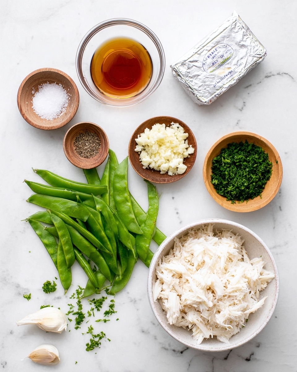 The image shows a white bowl full of light, shredded crab meat near the bottom right, sitting on a white marbled surface. To the left of the bowl, there is a pile of fresh, bright green snap peas spread out. Above the snap peas, there is a small glass bowl with a dark amber liquid, and above that, a small glass bowl with finely minced garlic. To the right of the garlic and slightly higher, a rectangular silver foil package of cream cheese lies flat. Next to the cream cheese, on the right side, is a wooden bowl filled with finely chopped green parsley. Above the parsley, there is a small wooden bowl of coarse white salt, and to the left of it, another wooden bowl with ground black pepper. Three garlic cloves are placed just below the pepper bowl on the left side. Small bits of parsley are scattered lightly on the white marbled surface around the bowls photo taken with an iphone --ar 4:5 --v 7
