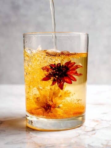 Herbal Iced Tea with Edible Flower, Blood Orange, and Fresh Fruit Infusions Recipe