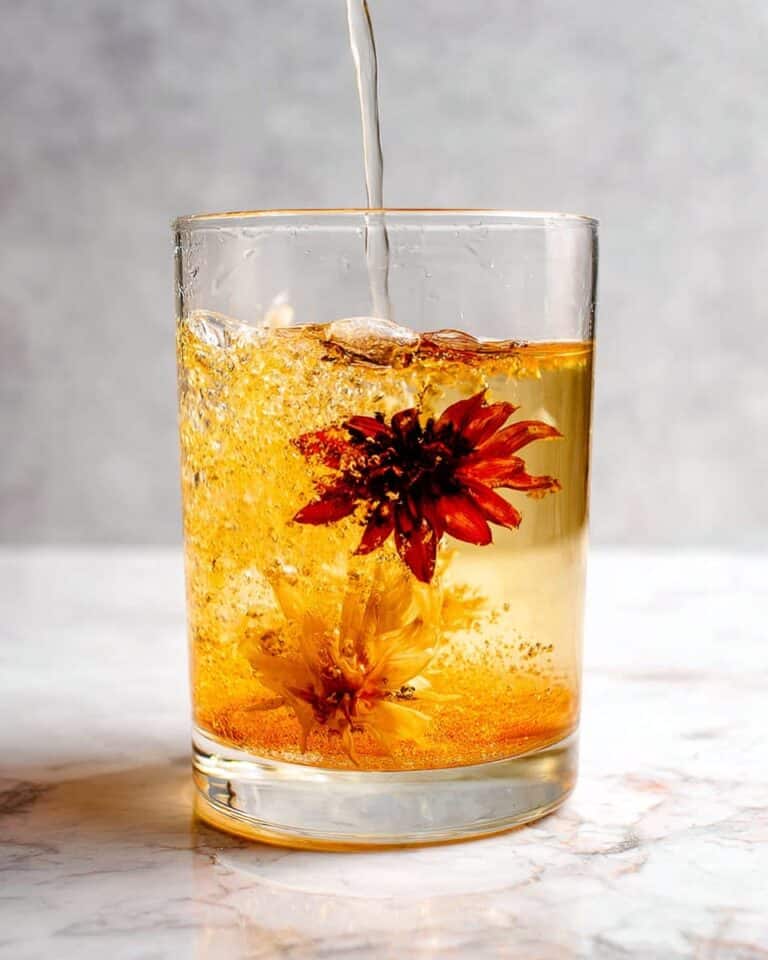 Herbal Iced Tea with Edible Flower, Blood Orange, and Fresh Fruit Infusions Recipe