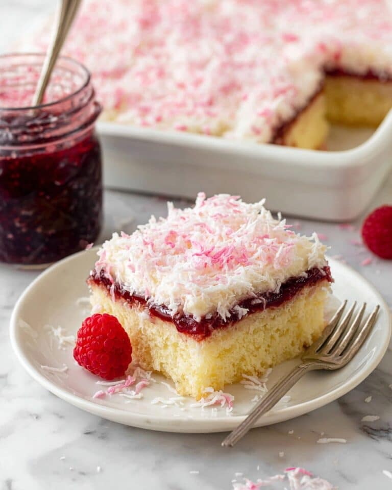 Raspberry Zinger Cake with Raspberry Filling, Marshmallow Frosting, and Pink Coconut Topping Recipe