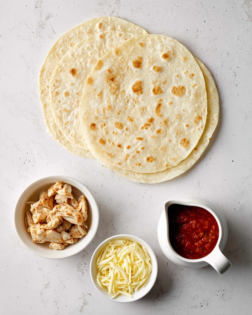 Two soft, round, white tortillas are stacked on a white marbled surface, slightly overlapping. Below and to the left, a small white bowl holds pieces of cooked, light brown chicken with a textured surface. Next to it, another small white bowl contains shredded pale yellow cheese. To the right, a small white pitcher holds thick red salsa with visible chunks. photo taken with an iphone --ar 4:5 --v 7