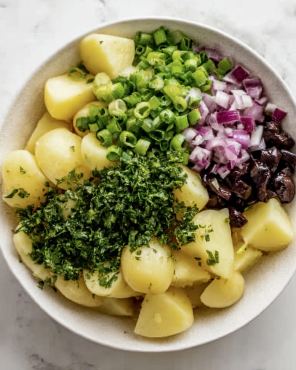 The image shows a group of eleven light brown potatoes with rough skin placed on a white marbled surface on the left side. On the right side, there are six small clear glass bowls arranged in two rows; the top row holds chopped green herbs, chopped green onions, and another kind of chopped green herb, while the bottom row holds a small whisk inside a bowl of yellow liquid, chopped red onions, and dark sliced olives. The scene has a bright and clean look, with all ingredients clearly visible and well spaced. Photo taken with an iphone --ar 4:5 --v 7