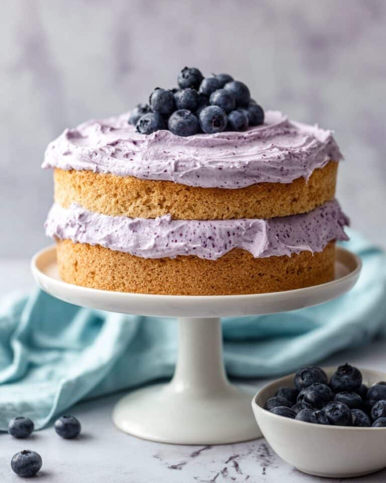Healthier Banana Blueberry Smash Cake with Whipped Cream Frosting Recipe
