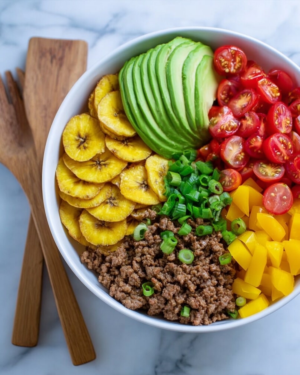 A white bowl filled with six distinct layers arranged side by side: bright green avocado half on the left, next to small red diced bell peppers, followed by a neat row of golden yellow plantain chips. To the right of the chips, there are halved red cherry tomatoes, next to chopped yellow bell peppers, and finally a mound of cooked ground meat topped with chopped green onions. The bowl is placed on a white marbled surface, with two wooden salad forks leaning against it. Photo taken with an iphone --ar 4:5 --v 7