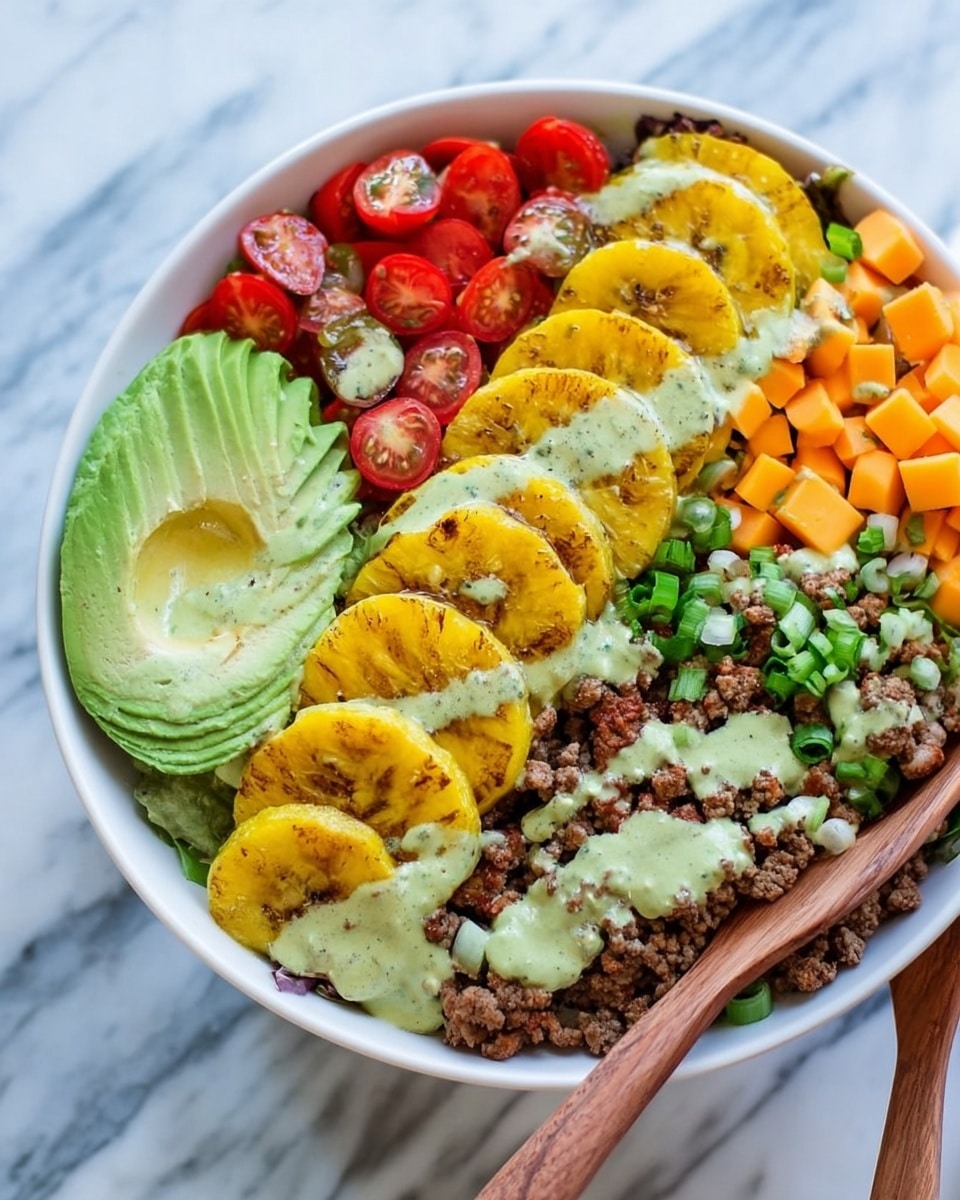 A white bowl filled with a colorful layered salad on a white marbled surface. Starting from the left side, there is half an avocado with creamy green texture, next to it are red bell pepper pieces mixed with a creamy light green dressing. In the middle, there is a line of yellow plantain slices with some light grill marks, stacked closely next to each other. On the upper left, small halved red cherry tomatoes are lightly covered with the same green dressing. On the upper right side, there are orange cubed pieces of cheese, beside chopped green onion rounds. The far right is filled with crumbled cooked ground meat, all lightly drizzled with the green creamy dressing. Next to the bowl, a woman's hand is holding wooden salad tongs. Photo taken with an iphone --ar 4:5 --v 7