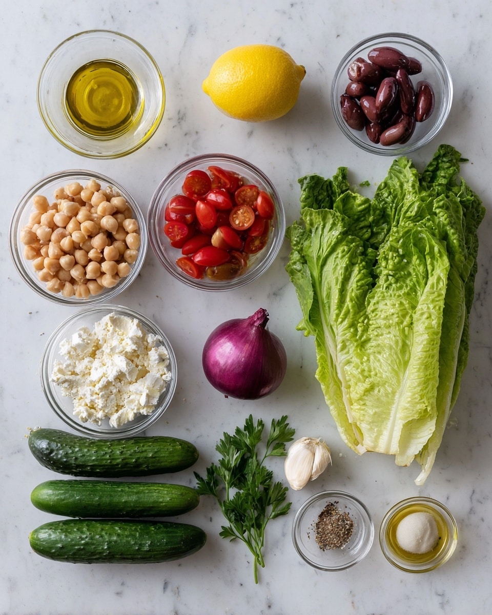 The image shows fresh salad ingredients laid out neatly on a white marbled surface. On the right, there is a whole head of green romaine lettuce with crinkled leaves. To its left, there are two glass bowls with pale beige chickpeas and dark purple olives, below which sits a glass bowl with white crumbled cheese. Nearby, there are three long, dark green cucumbers stacked horizontally. Above the cheese, a whole yellow lemon is placed, and next to it, there are three small glass bowls containing red grape tomatoes, a creamy pale yellow mustard sauce, and mixed salt and pepper seasoning. A whole purple onion and green parsley leaves rest near the center, with a single white garlic clove beside a small glass bottle of olive oil. The overall look is colorful and fresh, set on the simple white marbled background. Photo taken with an iphone --ar 4:5 --v 7