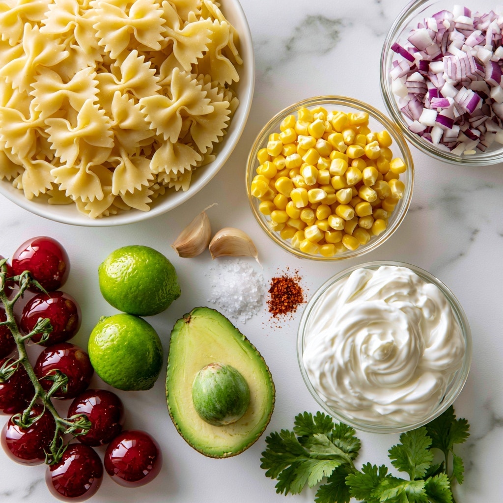 A white bowl filled with pale yellow farfalle pasta sits on a white marbled surface in the top left. To the right, a small clear glass bowl contains bright yellow corn kernels, below it another bowl holds thick white Greek yogurt. Shiny deep red cherry tomatoes on the vine lie to the left bottom side near two bright green limes and a halved avocado showing its green flesh and seed. Above the avocado, two peeled garlic cloves are placed next to a small pile of white salt and a smaller pile of reddish cayenne powder. Fresh green cilantro leaves rest near the bottom right corner. A clear glass bowl with finely diced purple and white red onion is near the top right. Everything is arranged neatly with clear labels above each item, all on a smooth white marbled background photo taken with an iphone --ar 4:5 --v 7