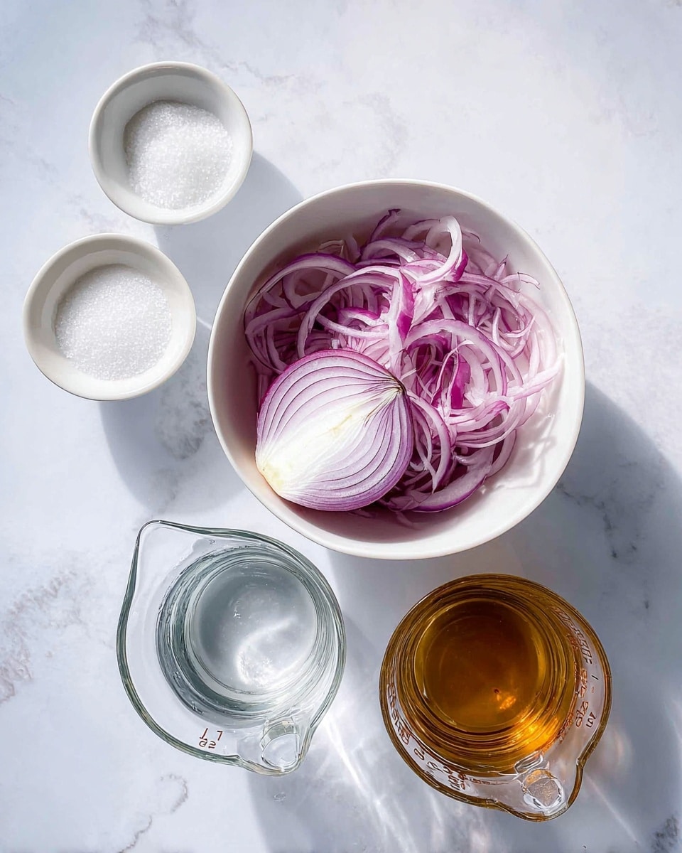A white bowl sits in the center filled with thinly sliced purple onions and a half purple onion on top showing its layers in white and purple shades. Above the bowl on the white marbled surface, there is a small white bowl of coarse salt to the left and a small white bowl of fine white sugar to the right. Below the bowl, there are two clear glass measuring cups, one filled with a light amber liquid and the other with clear water. The composition is simple with soft natural light casting gentle shadows. photo taken with an iphone --ar 4:5 --v 7