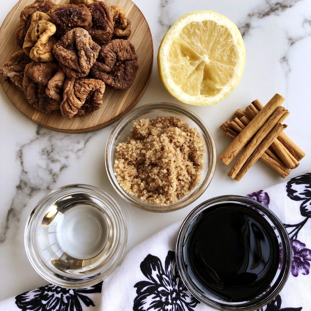 The image shows six ingredients arranged neatly on a white marbled surface. On the top left, there is a group of brown dried figs with a rough texture, placed on a round wooden board. To the right of the figs is a half lemon, showing its pale yellow juicy inside and smooth peel. Below the lemon is a small pile of light brown cinnamon sticks with a rough texture. In the center, there is a clear glass bowl filled with light brown finely textured brown sugar. Below it and slightly to the left, a small clear glass bowl contains clear water, reflecting light softly. At the bottom right, another glass bowl is filled with thick dark black balsamic vinegar that has a glossy surface. A woman's hand is not present in the scene. The items sit partly on a white cloth with black and purple floral patterns. Photo taken with an iphone --ar 4:5 --v 7