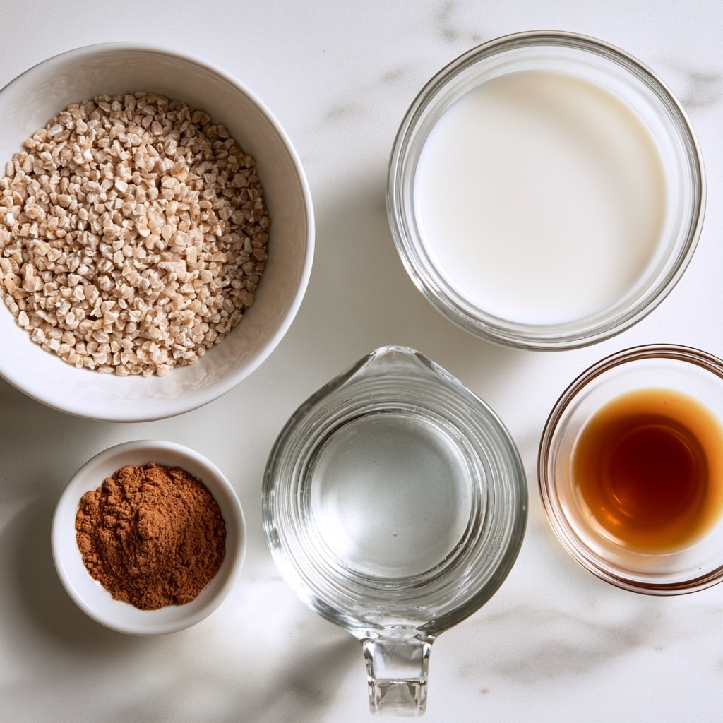 The image shows six containers of ingredients arranged on a white marbled surface. At the top left, a white bowl filled with light beige steel cut oats. Below it, a small white dish holds a heap of brown cinnamon powder. In the center, a clear glass measuring cup contains transparent water. At the top right, a clear glass bowl is filled with white milk, and next to it on the right is a small clear bowl holding golden-brown vanilla extract. The containers are neatly spaced, with the overall arrangement giving a clean and simple look. photo taken with an iphone --ar 4:5 --v 7