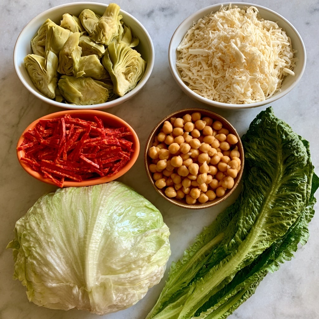 The image shows five main ingredients arranged on a white marbled surface. There are two white bowls at the top: the left one contains light green marinated artichoke hearts with soft texture, and the right one holds shredded mozzarella cheese in off-white color with a stringy texture. Below them, there is an orange bowl filled with thin strips of bright red Italian salami. Next, a round brown bowl contains smooth, golden chickpeas. On the bottom left, a round iceberg lettuce is placed with its pale green and white leaves tightly packed and slightly shiny. To the right of it, there is a long romaine lettuce with deep green, crisp leaves that are longer and looser than the iceberg. Photo taken with an iphone --ar 4:5 --v 7