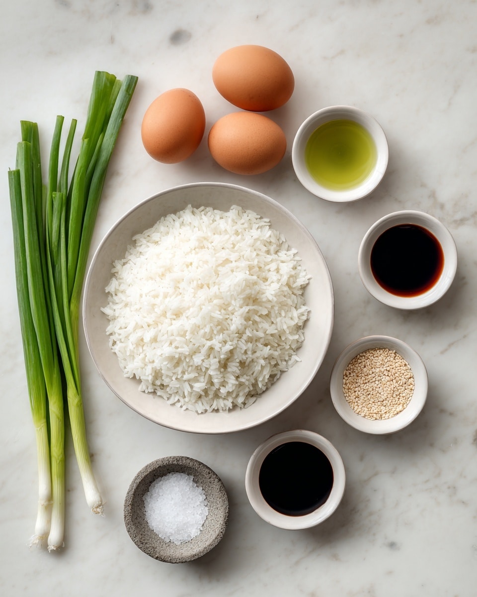 The image shows a white bowl filled with cold white rice placed on a white marbled surface. To the left of the bowl, there are three green onions with bright green tops and white bottoms laid vertically. Next to the green onions, three brown eggs are arranged close together. On the right side of the eggs, there are three small white bowls arranged vertically, each containing a different ingredient: the top bowl has clear oil, the middle bowl has dark soy sauce, and the bottom bowl has sesame seeds. A small stone dish with white salt is placed beside the sesame seeds bowl. Each item is labeled with simple black text on a white background. photo taken with an iphone --ar 4:5 --v 7