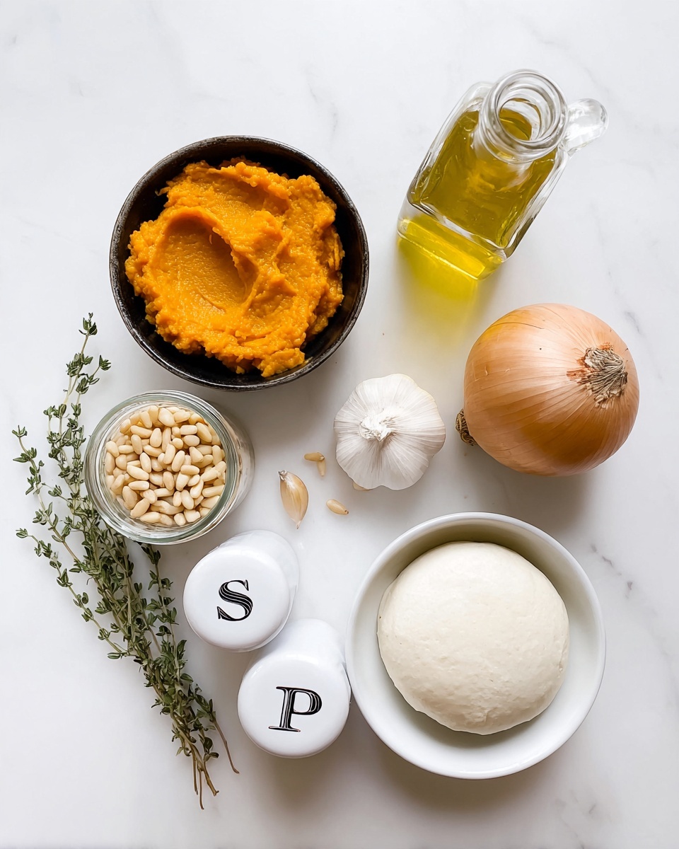 The image shows several ingredients arranged neatly on a white marbled surface. On the left side, there is a small black bowl filled with bright orange puree with a thick, textured surface. Next to it is a small glass jar with pale yellow pine nuts inside. Below these is a pair of white salt and pepper shakers with letters