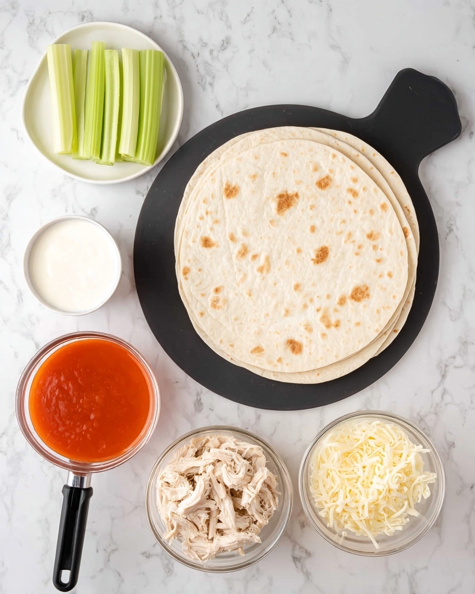 A black round board holds a stack of three off-white tortillas with a soft, smooth texture and light brown spots scattered evenly. Above it, a white plate holds bright green celery sticks lying flat, each with a fresh look and slight shine. To the left of the board is a small white bowl filled with thick white sauce that looks creamy and smooth. Below the board, two clear measuring cups with black handles hold shredded light beige cooked chicken on the left and shredded pale yellow cheese on the right, both arranged in neat piles. To the far left is a clear rounded glass bowl filled with bright red-orange sauce with a shiny surface. All items sit on a surface with white marble texture and subtle grey veins. Photo taken with an iphone --ar 4:5 --v 7